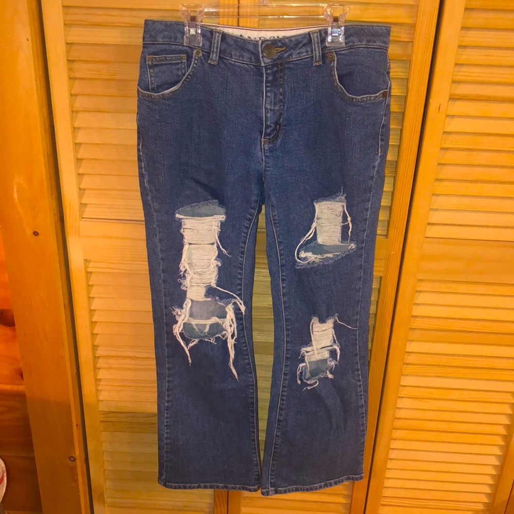 Ripped boot leg jeans